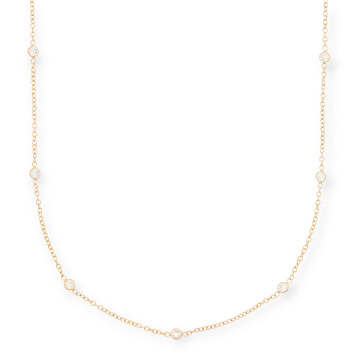 Cuffed by Nano LLC Keke station necklace featuring a 14k gold filled cable chain with bezel set cubic zirconia stones.