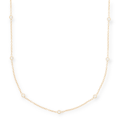 Cuffed by Nano LLC Keke station necklace featuring a 14k gold filled cable chain with bezel set cubic zirconia stones.