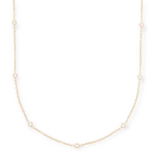 Cuffed by Nano LLC Keke station necklace featuring a 14k gold filled cable chain with bezel set cubic zirconia stones.