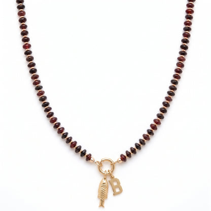 fishy initial brown beaded necklace